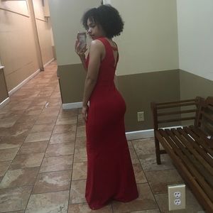 Bright red, floor length gown.